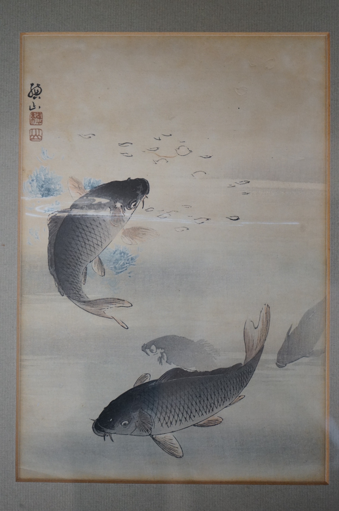 Two Japanese woodblock prints, to include Ito Sozan (1884-1926), Two carp in a river, and one other, largest 23 x 16cm. Condition - fair
